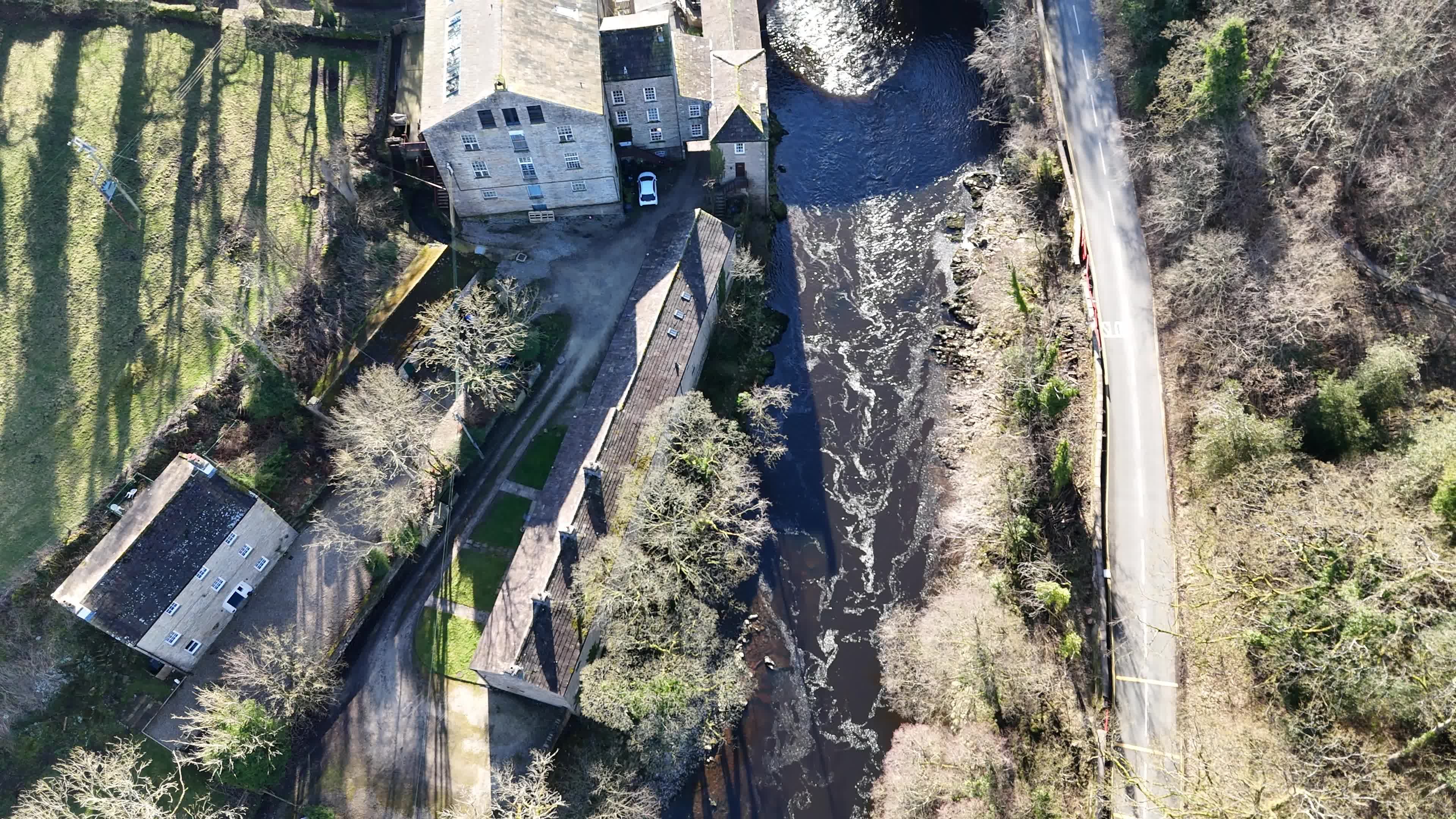 Scenic Aerial View of Riverside Buildings and Bridge Free Stock Video ...