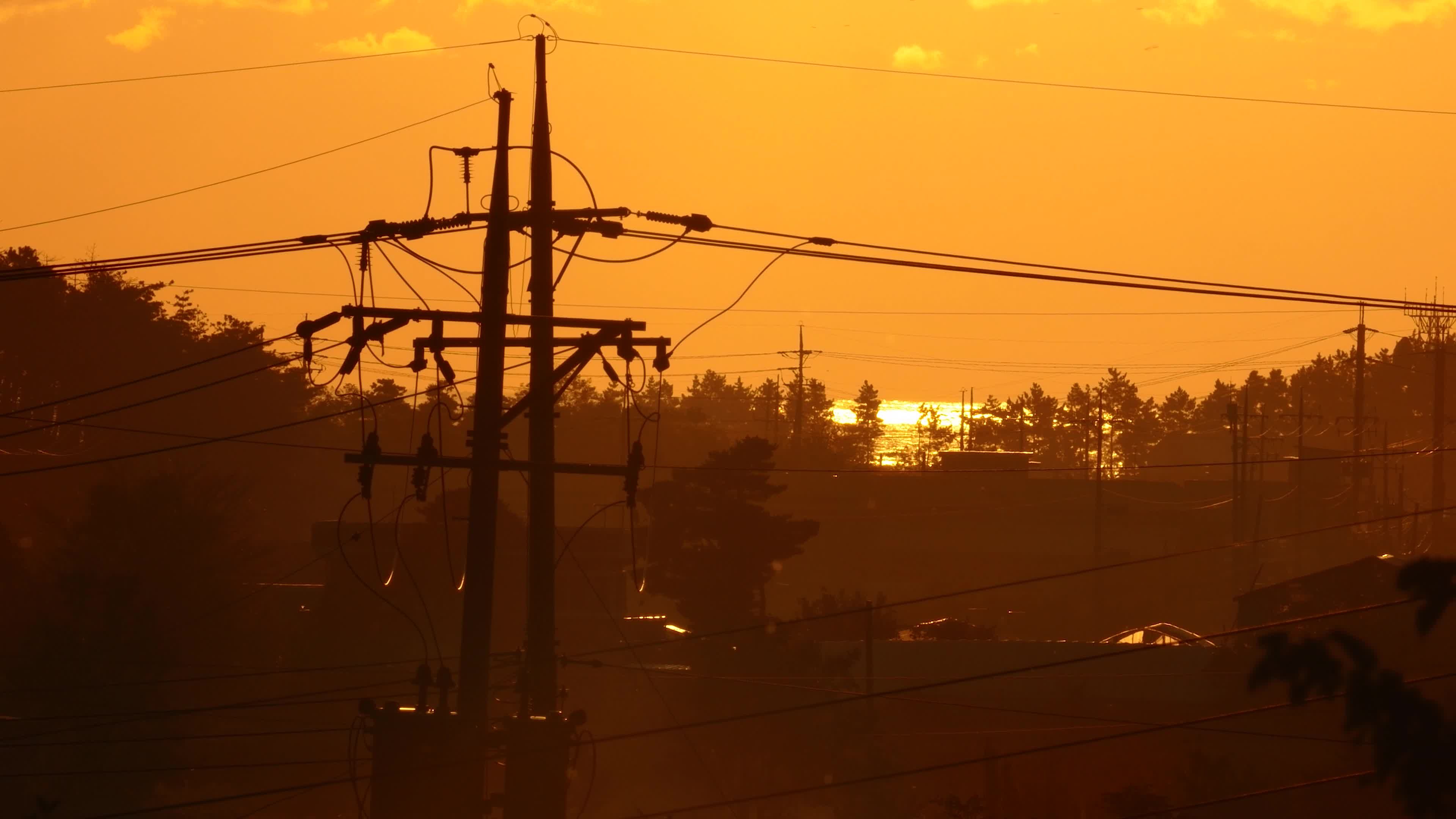 Sunset Silhouette of Power Lines Against Golden Sky Free Stock Video ...