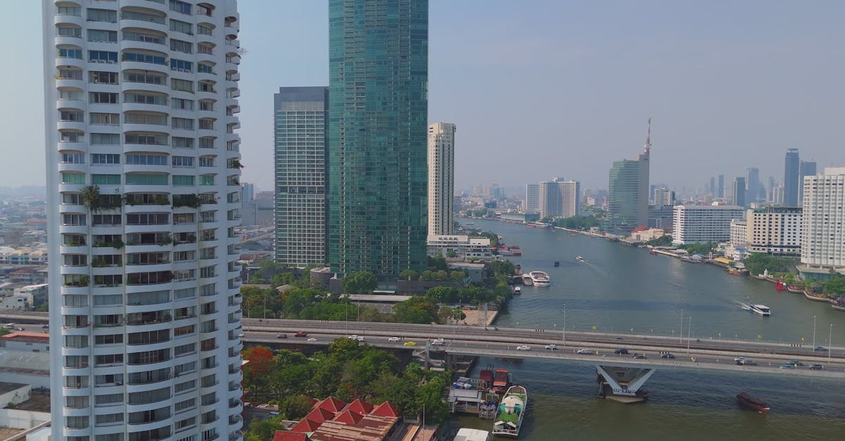 Aerial View of Bangkok's Skyscrapers and River Free Stock Video Footage ...