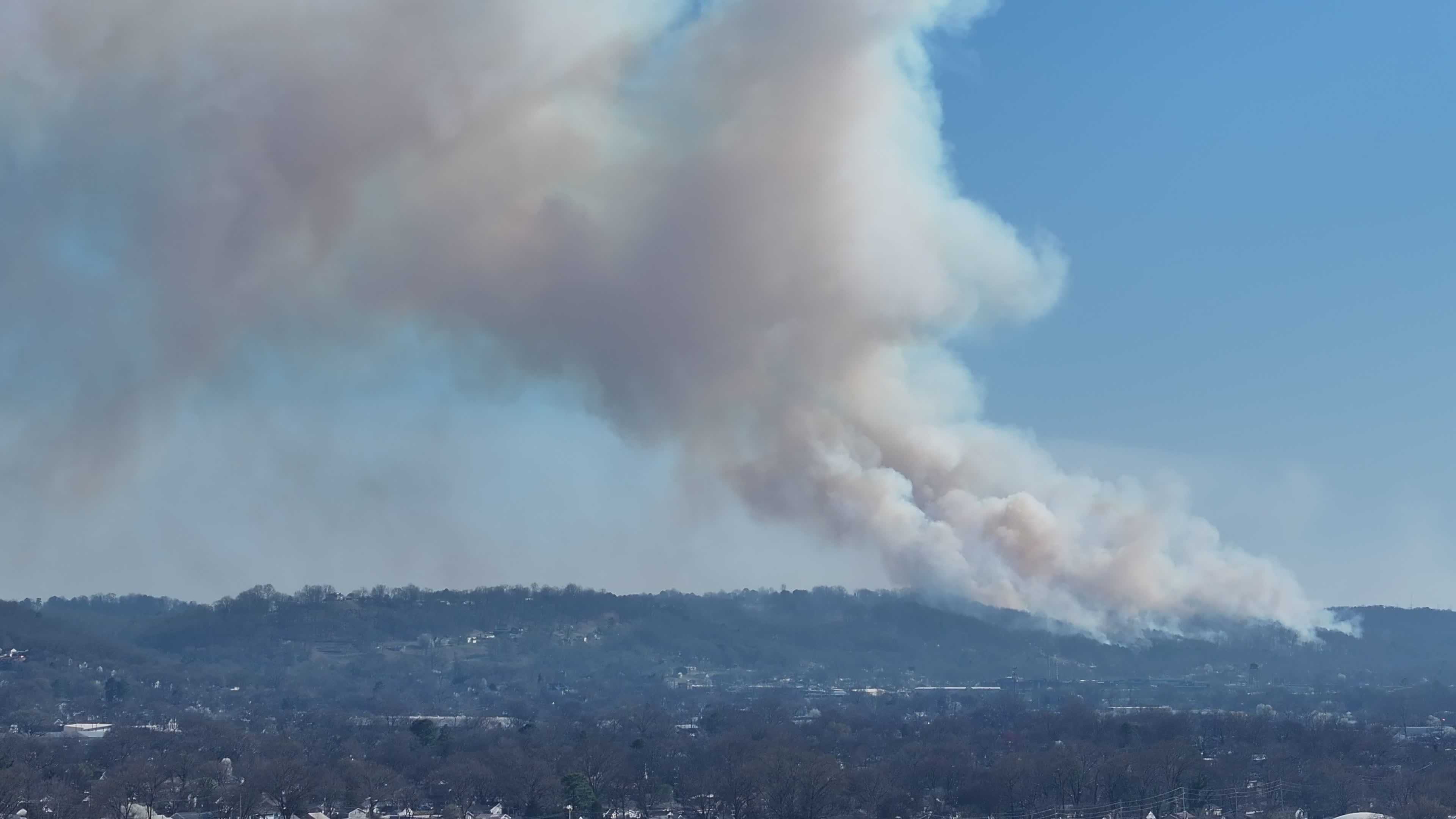Distant Smoke Rising Over Forested Landscape Free Stock Video Footage ...