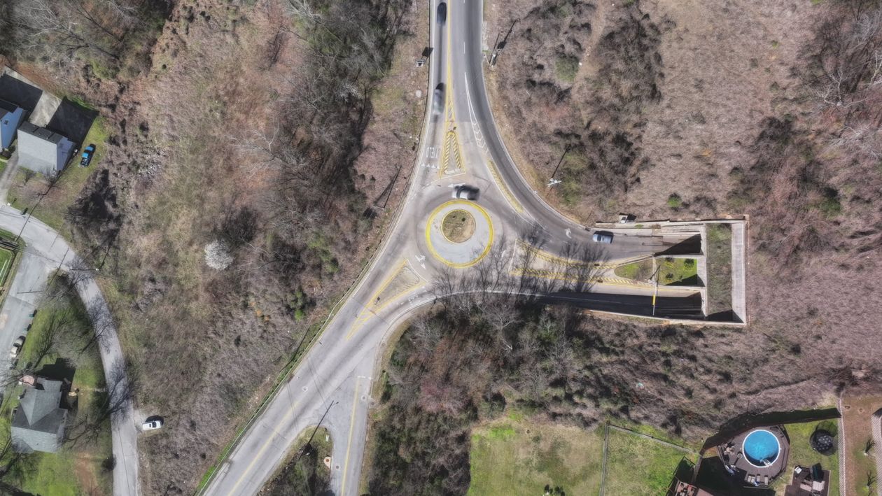 Aerial View of a Traffic Roundabout in Fall Free Stock Video Footage ...