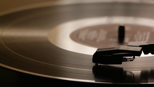 A Turntable In Operation Playing A Vinyl Record