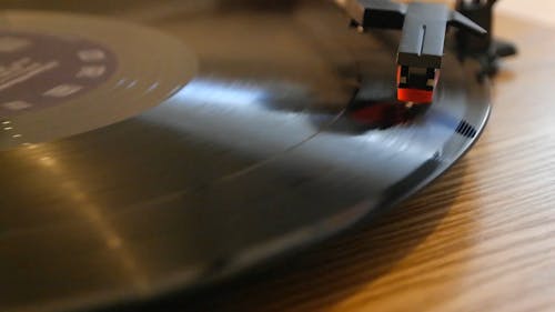 A Vinyl Record Is Playing In A Turntable