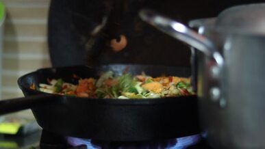 vibrant stir fry vegetables in cast iron skillet