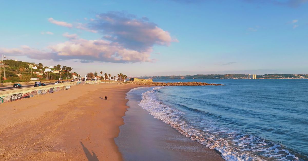 Aerial View Of Oeiras Beach Portugal At Sunrise Free Stock Video aerial-view-of-oeiras-beach-portugal-at-sunrise-free-stock-video