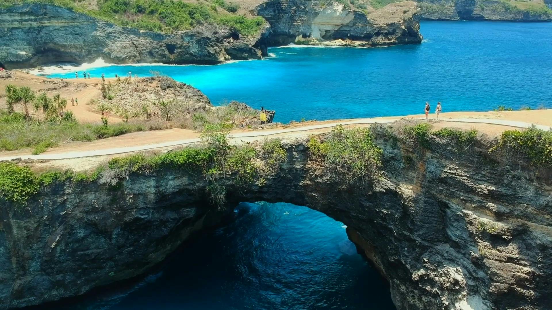 A Natural Bridge Of Rock Formed By Erosion · Free Stock Video