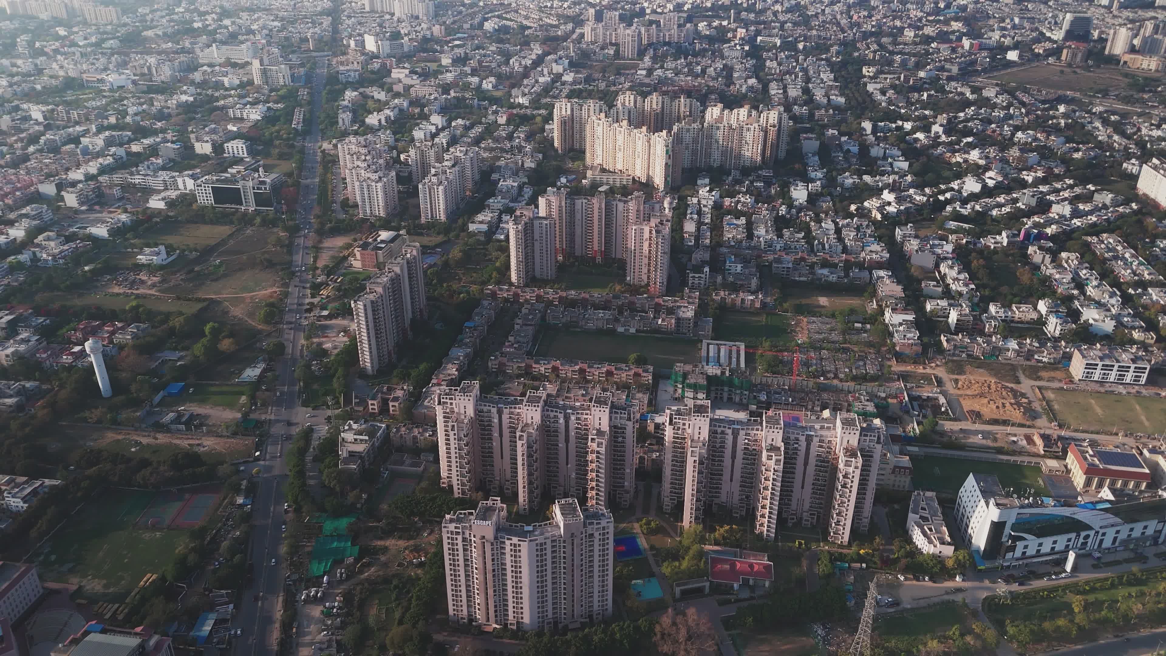 Aerial View of Expansive Cityscape with High-Rise Buildings Free Stock ...