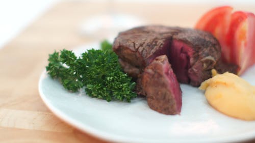 Steak Cooked Medium Rare In A Plate