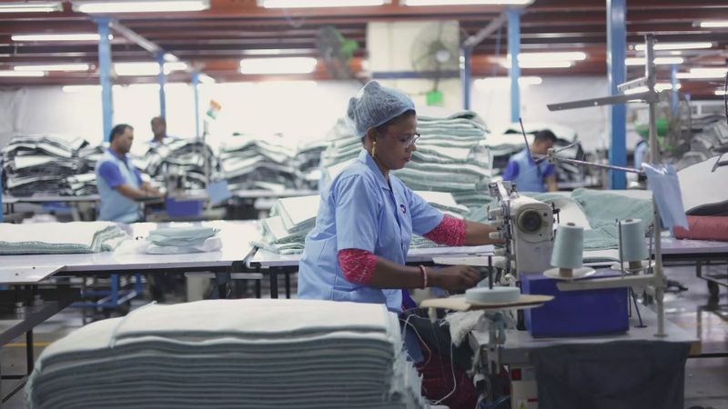 Factory workers on production line