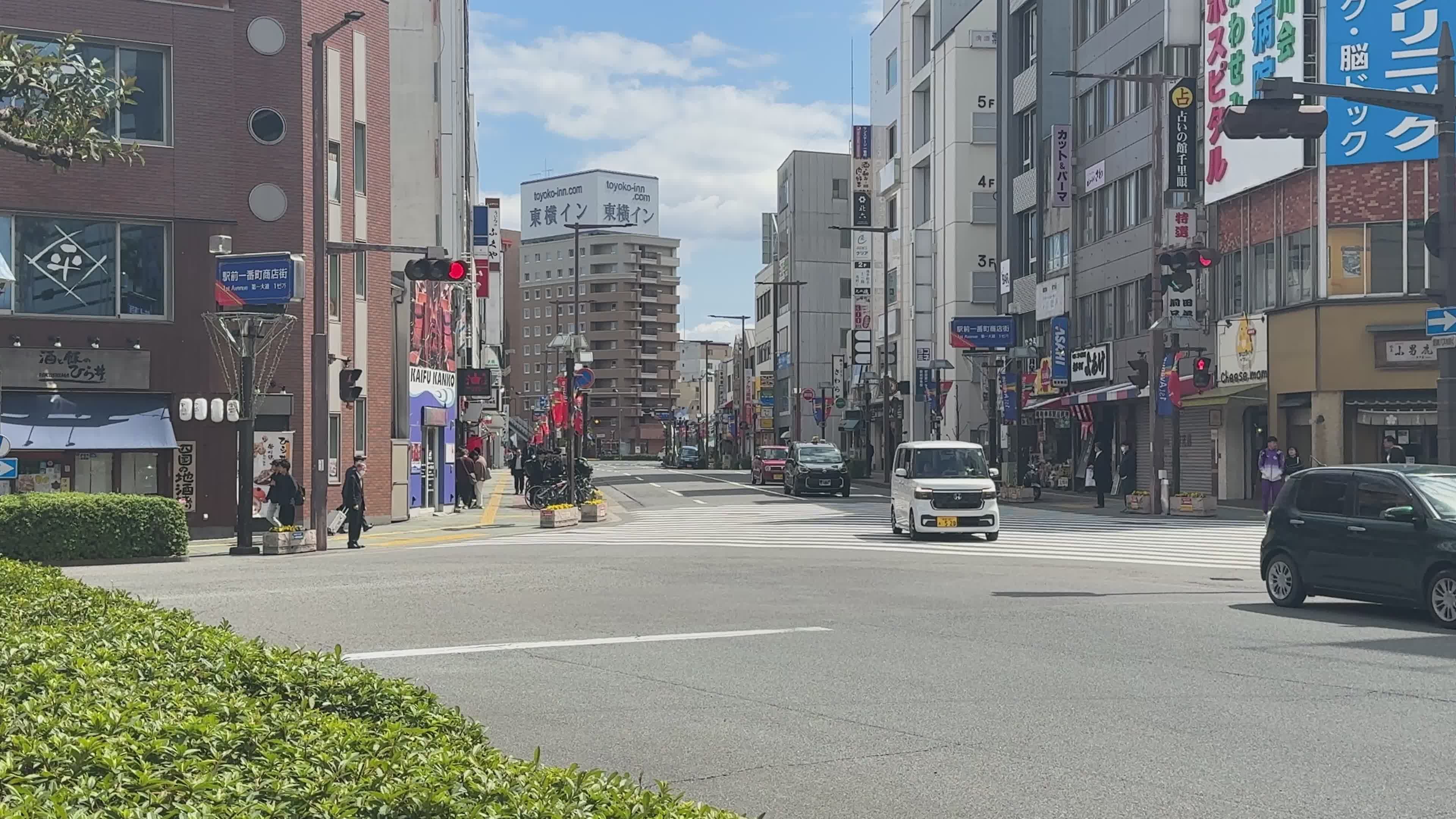 Busy Urban Street Scene with Traffic and Buildings Free Stock Video ...