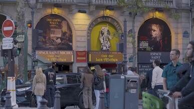 vibrant evening scene in saint michel paris