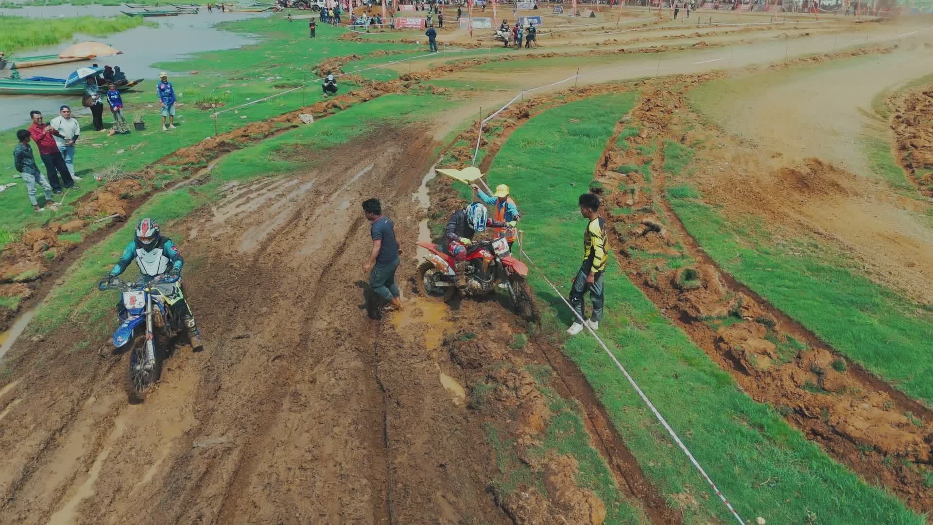 Aerial View of Motorcycle Racing on Muddy Track Free Stock Video ...