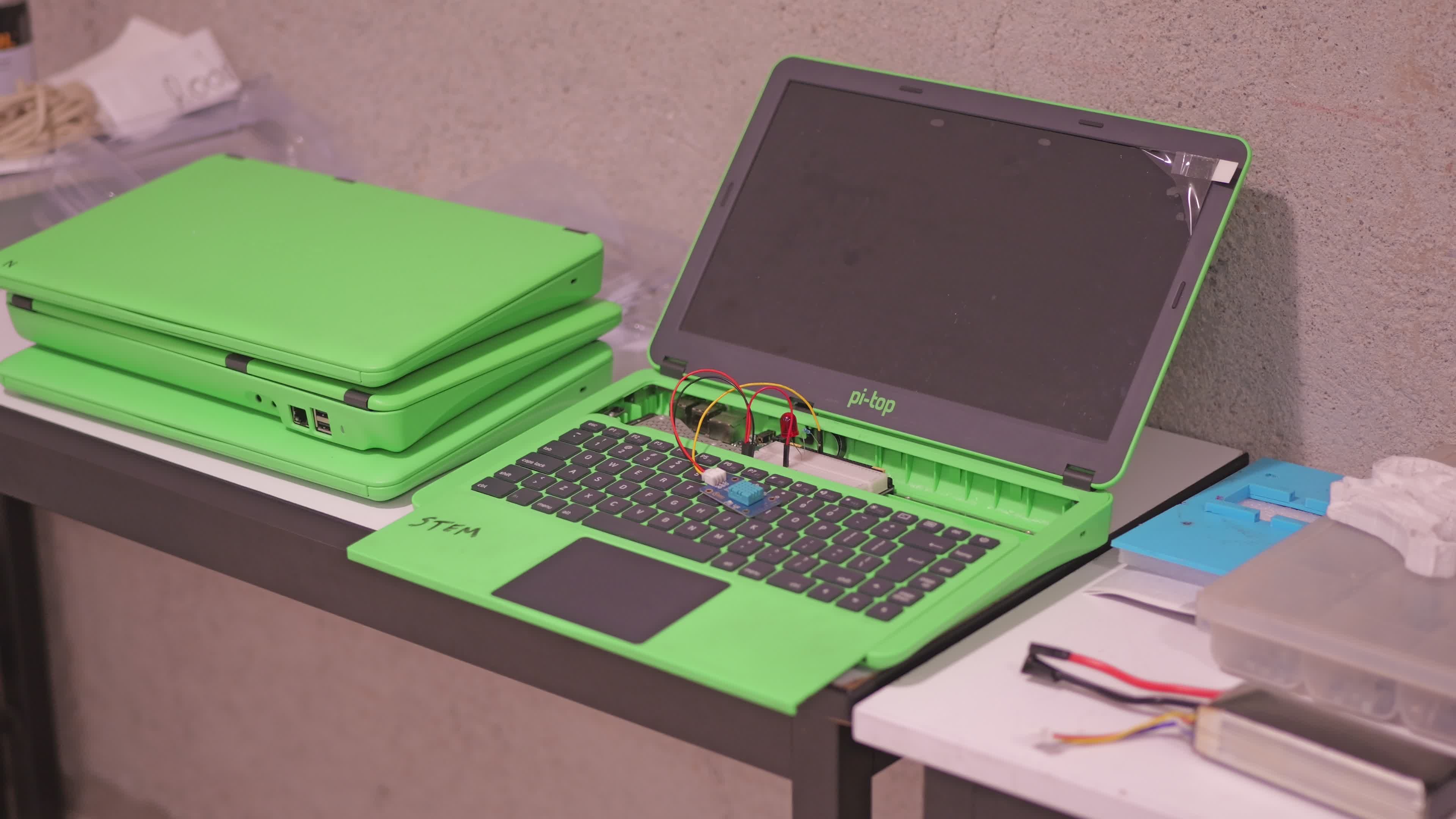 green laptop with exposed internal components 31575759 — free pexels stock footage