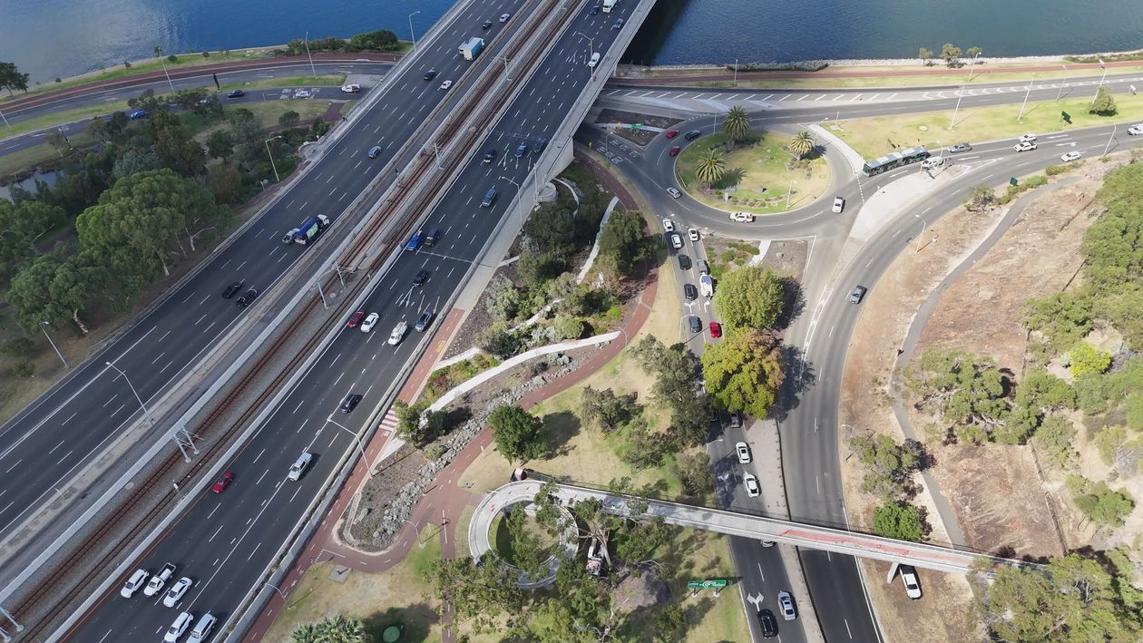 Aerial View of Bridge over River in Urban Landscape Free Stock Video ...