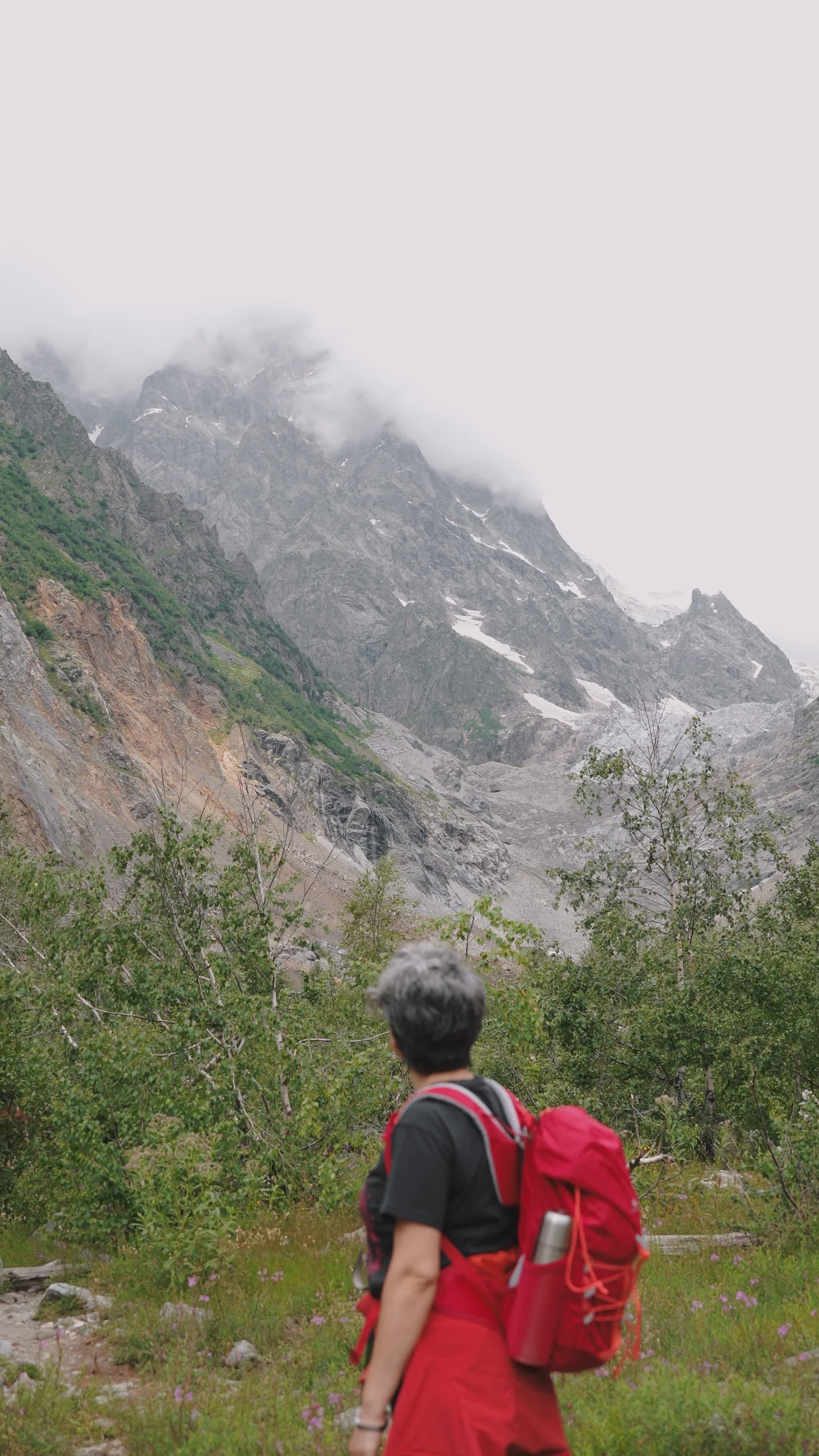 hiker exploring misty mountain trail 31640241