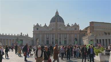 vatican city s st peter s square bustling with tourists