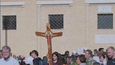 vatican city religious gathering with cross
