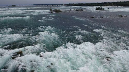 The Strong Force Of The River Flowing In Niagara Falls