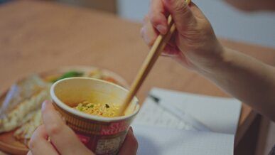writing and dining a cozy indoor meal