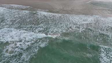drone captures serene ocean waves from above