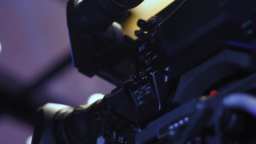 A Modern Video Camera Recorder Mounted On A Camera Stand