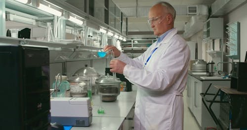 A Scientist Checking On A Liquid Solution 