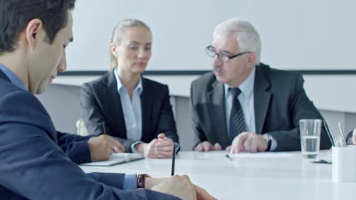 Group Of People Having A Meeting