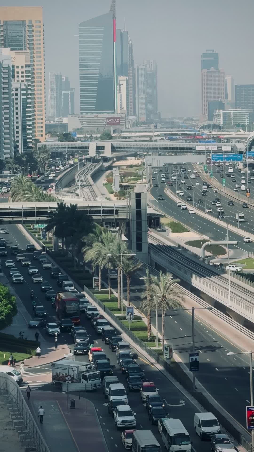 A city street with cars and tall buildings Free Stock Video Footage ...