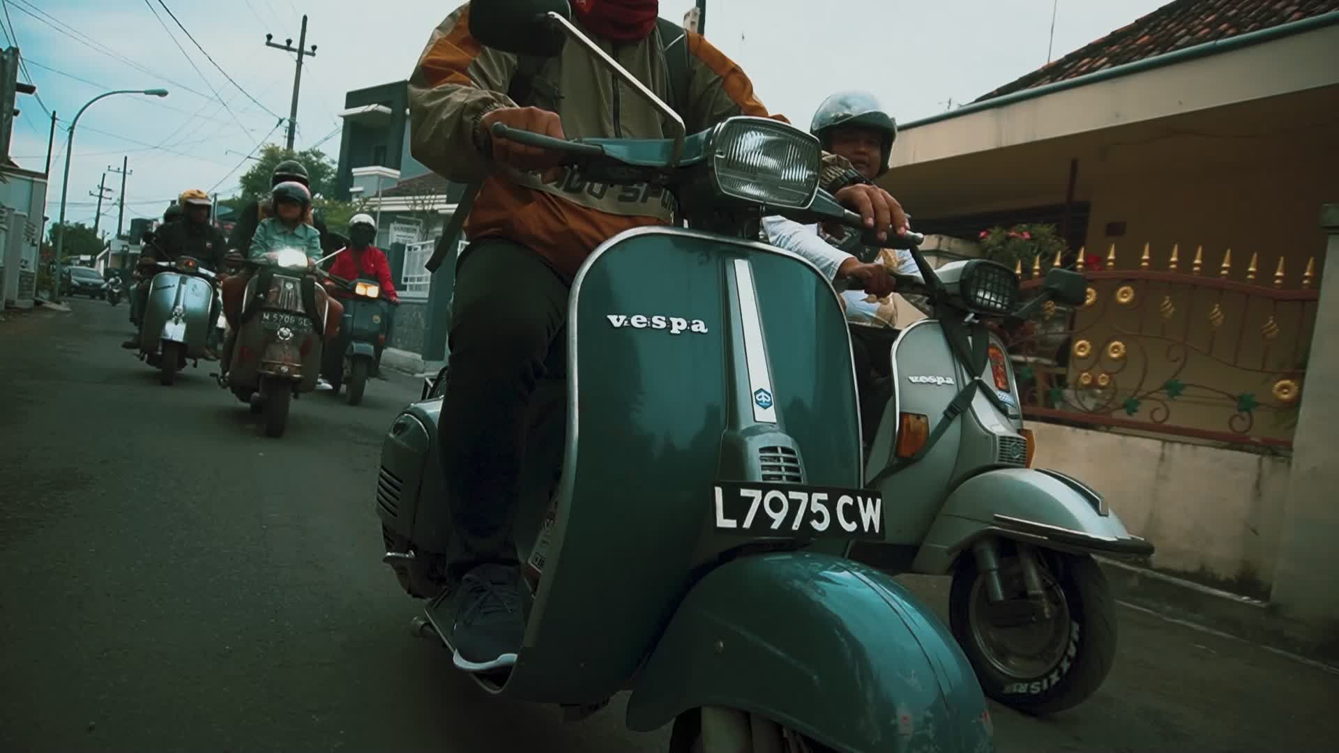 Vespa Back Rider Vespa Riders Enjoying a Scenic Urban Ride Free Stock Video Footage ...