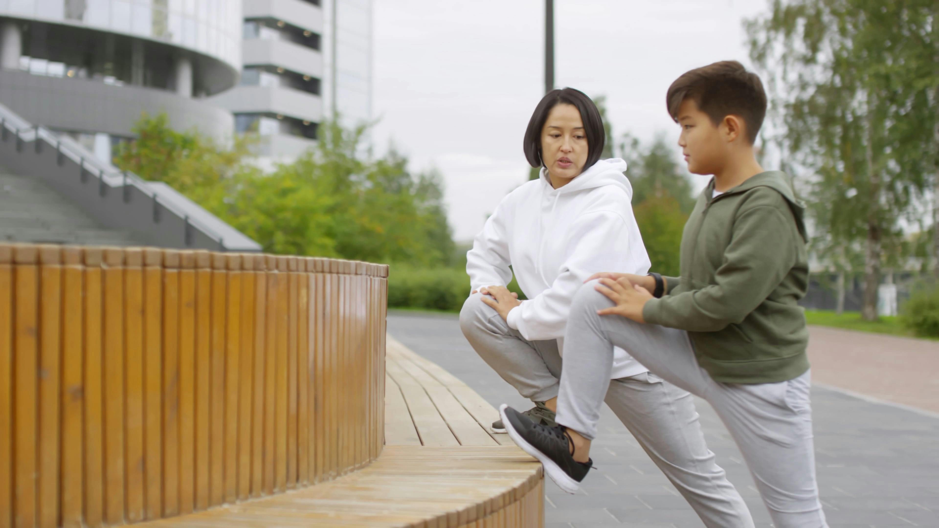 A Woman Teaching A Leg Stretching Exercise Free Stock Video Footage