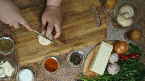 Slicing Fresh Mushroom Into Bits