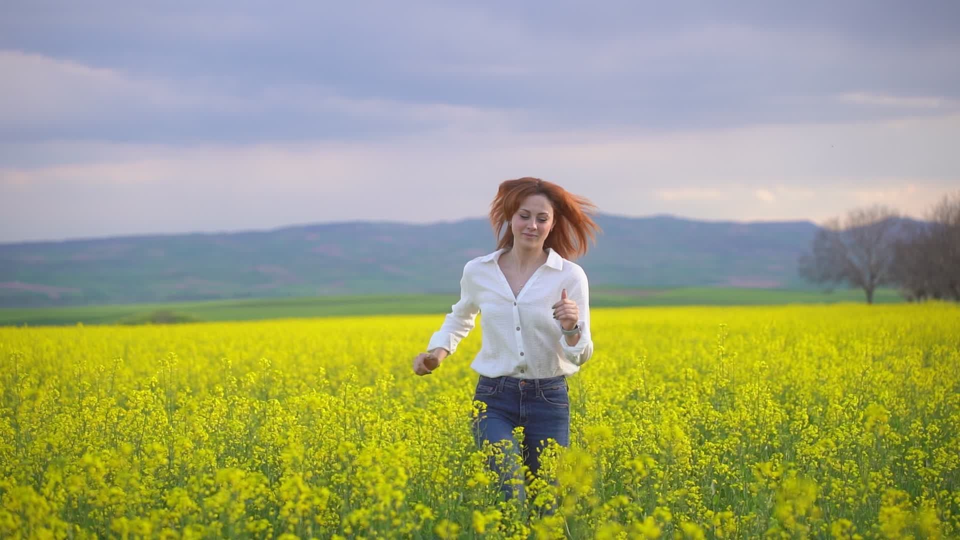 Joyful Woman Running through Spring Flower Field Free Stock Video ...