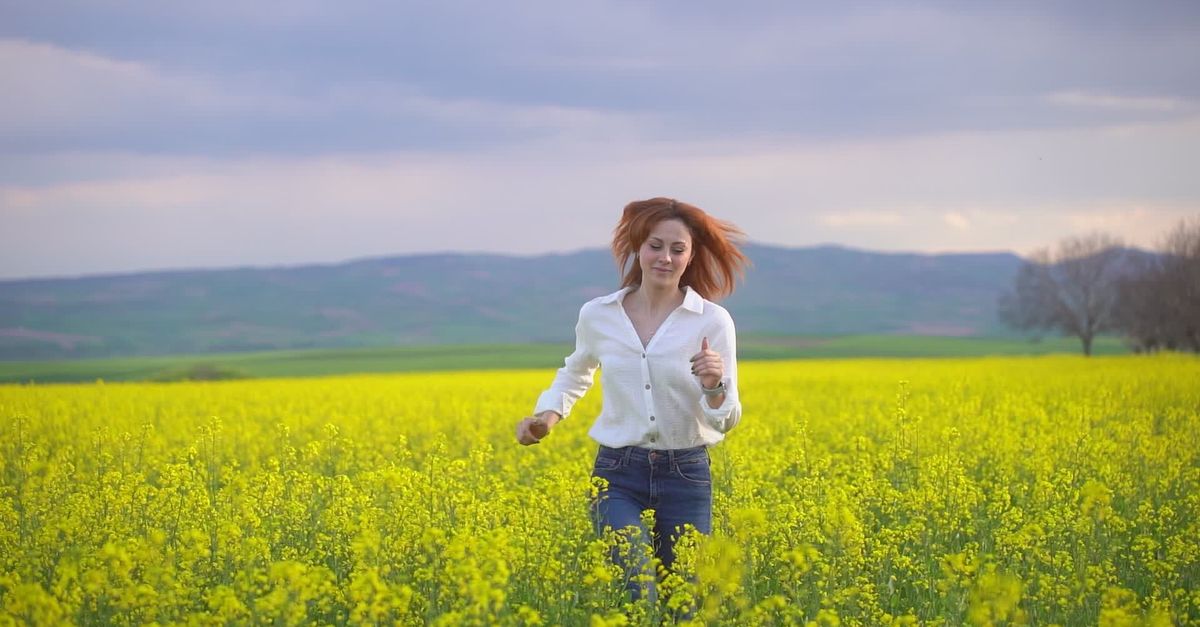 Spring Running Woman Joyful Woman Running through Spring Flower Field Free Stock Video ...