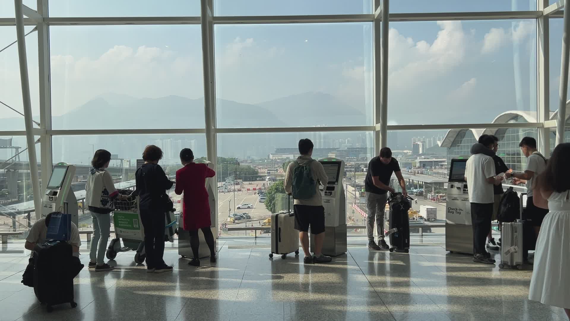 Airport Boarding Pass Kiosk with Travelers Free Stock Video Footage ...