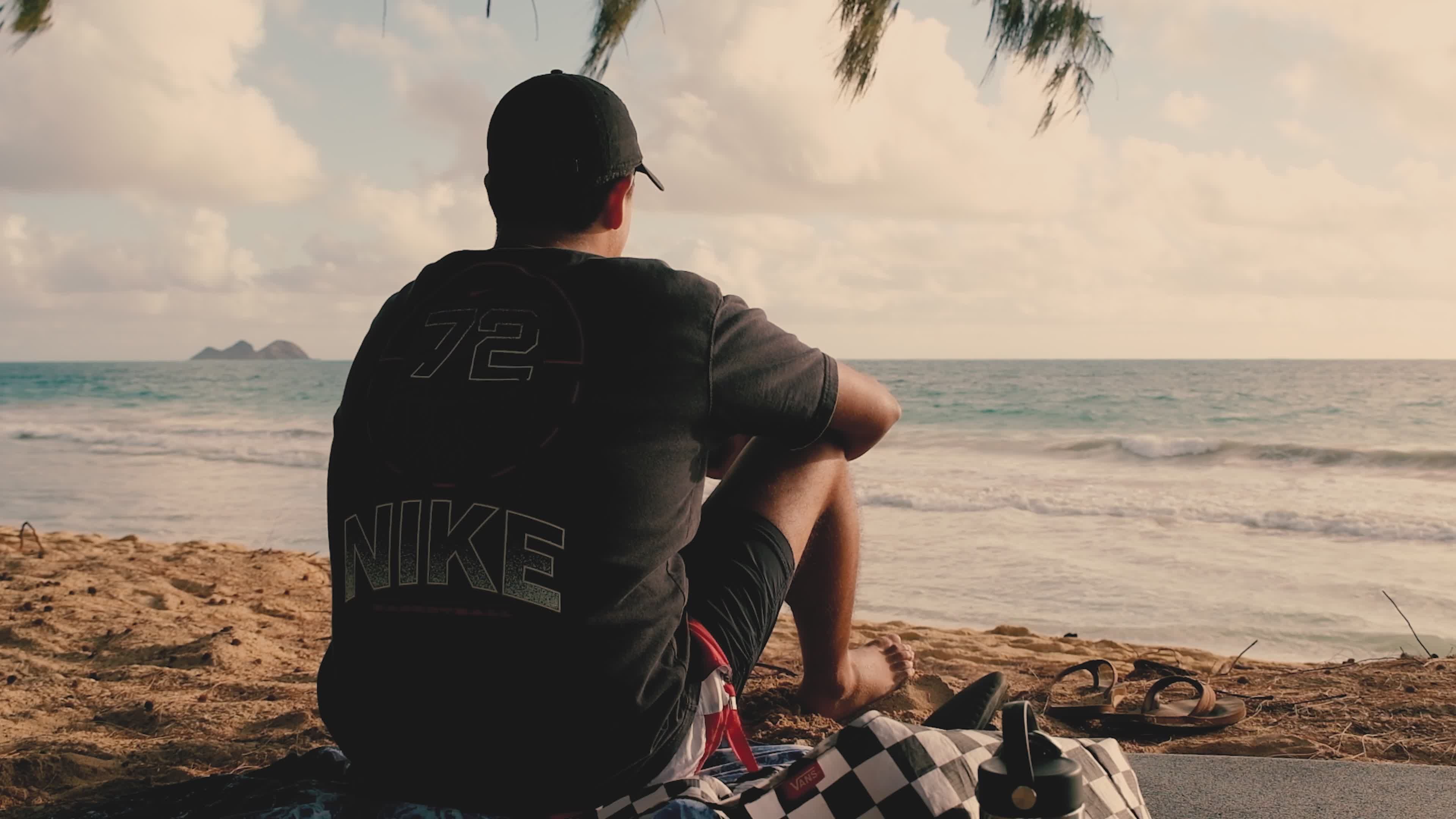 Relaxing Beach Scene with Man Reflecting at Sunset Free Stock Video ...