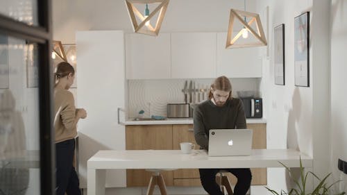 Group Of people Working And Talking In An Office Pantry