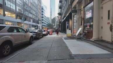 busy manhattan street scene with pedestrians