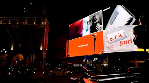 A Giant Electronic Billboard Screen Lighting Up The Street 