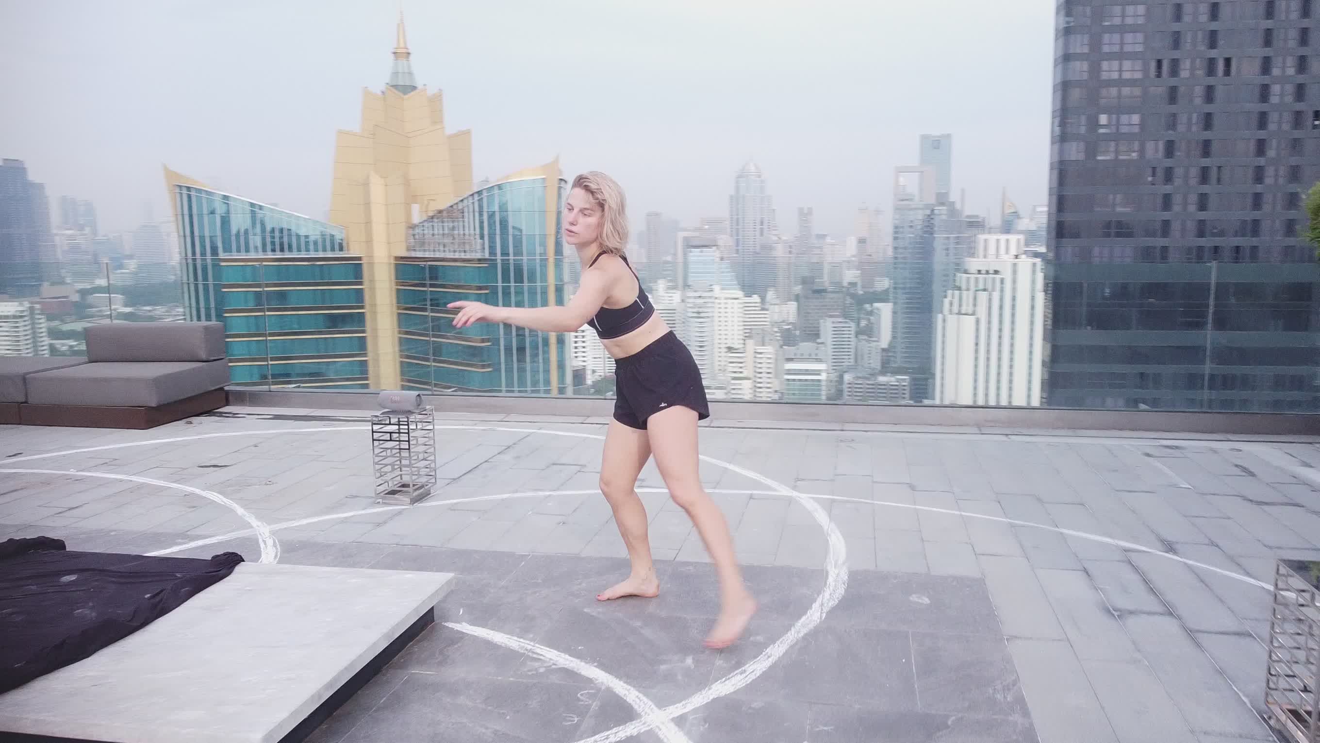 Graceful Rooftop Dance Over City Skyline Free Stock Video Footage ...