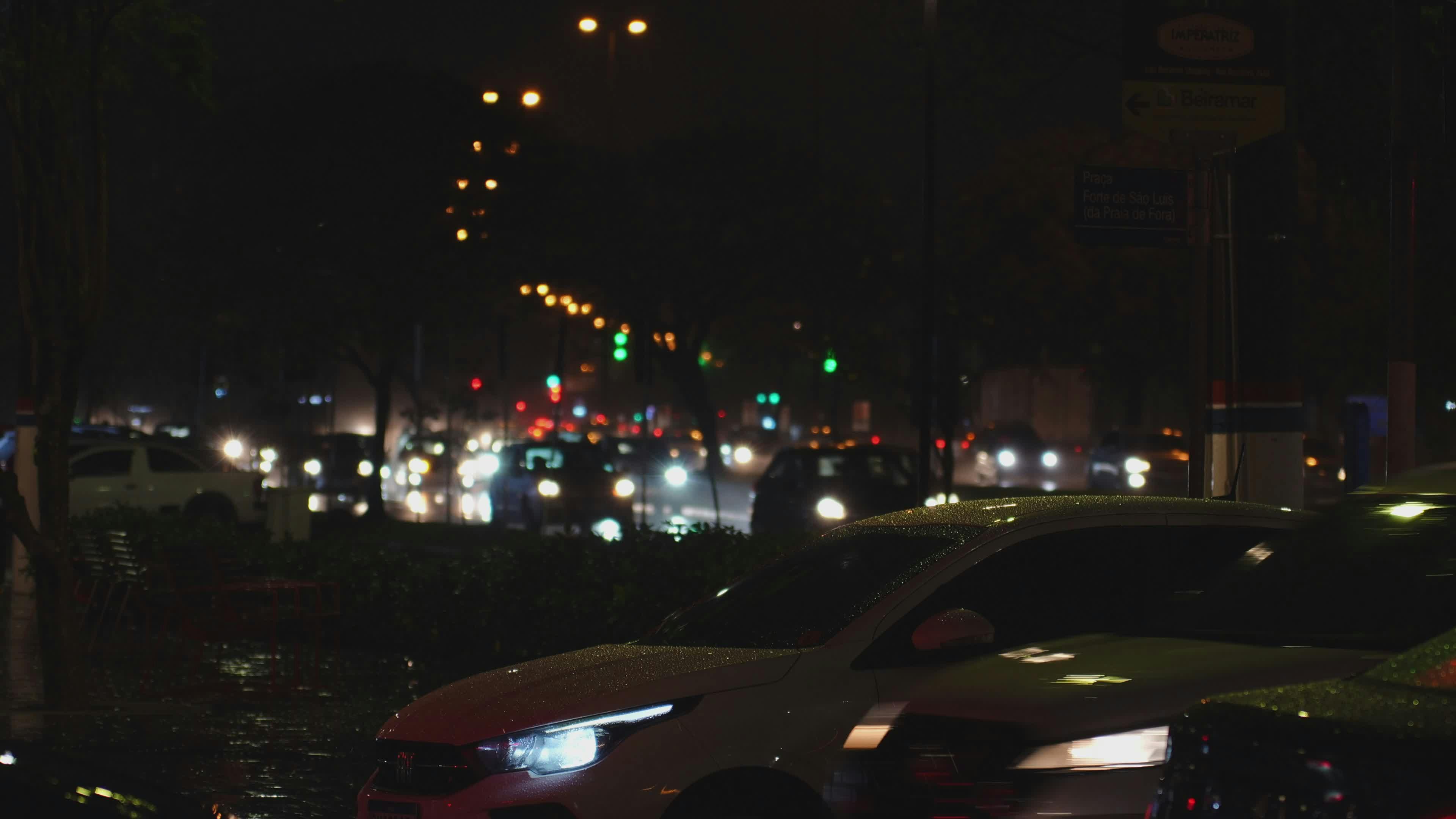 bustling night traffic with city lights 32161278