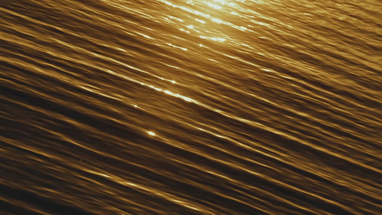 Golden Sunlight Reflecting on Ocean Waves Free Stock Video Footage ...