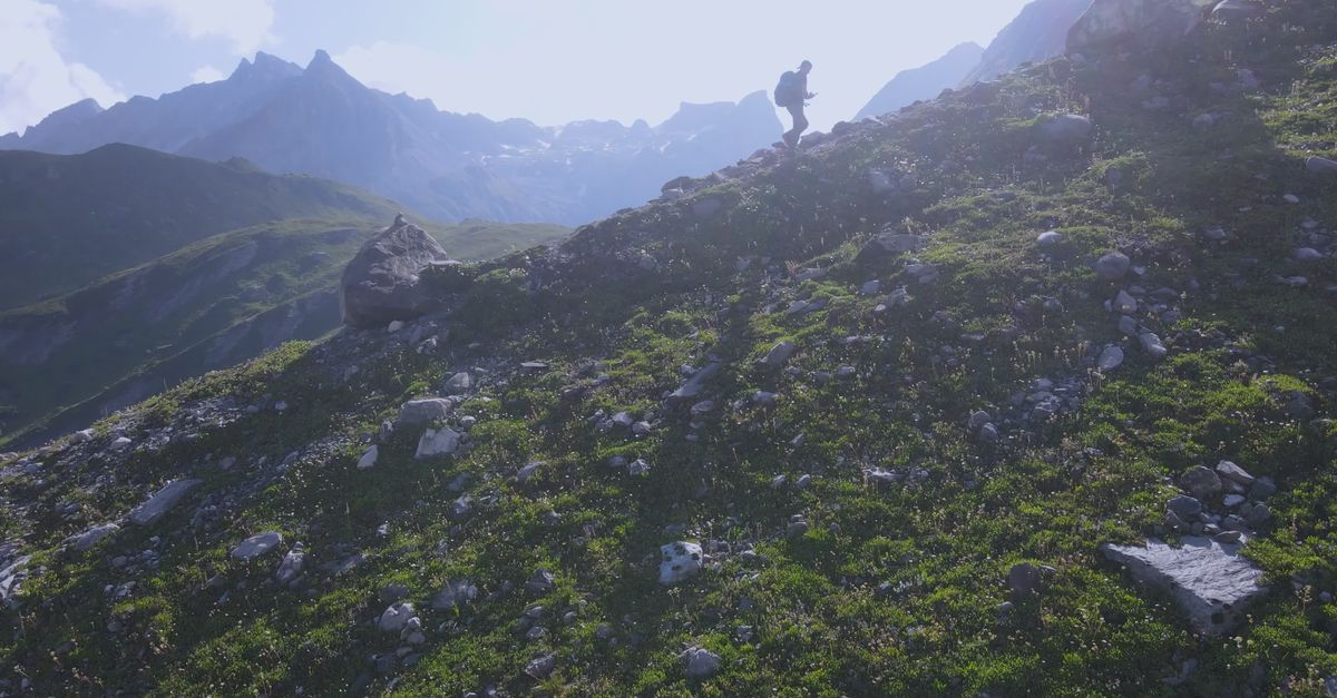 Alpine In Ridge Line Hiker Traversing Stunning Alpine Ridgeline Free Stock Video Footage ...