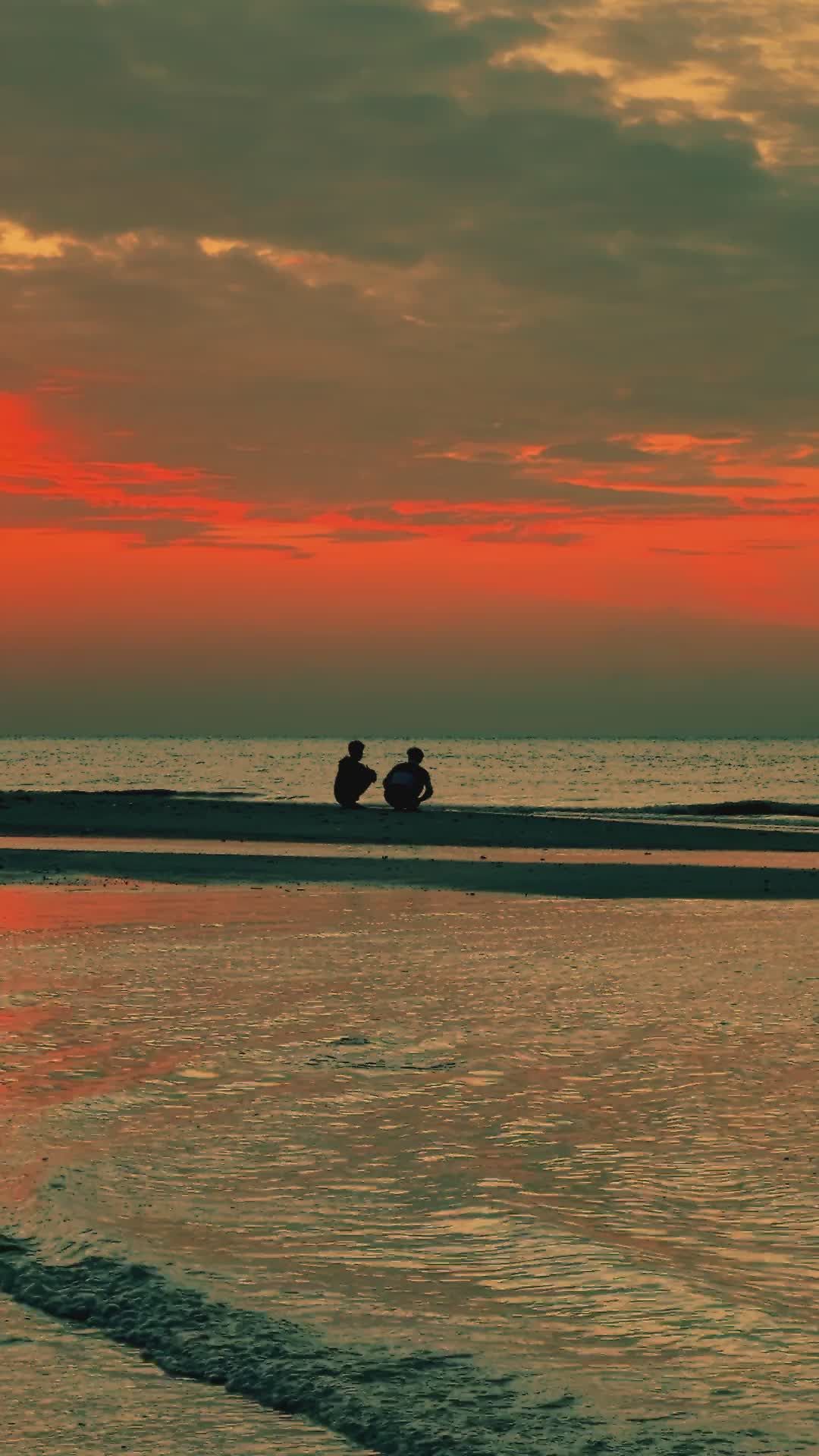 Peaceful Sunset Beach Scene with Silhouettes Free Stock Video Footage ...