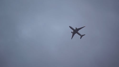 An Airplane Airborne In The Sky