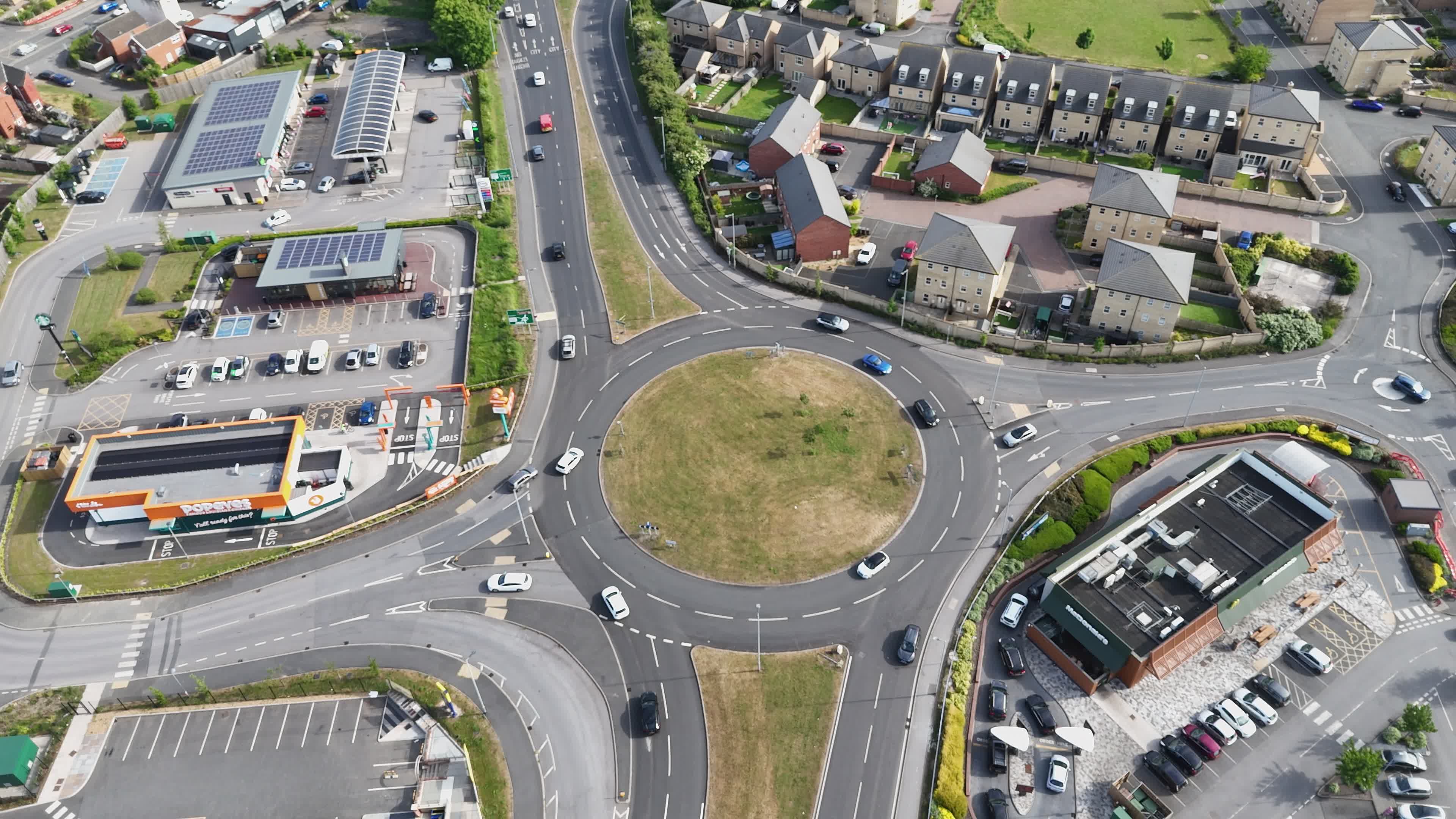 Aerial View of a Busy Urban Roundabout Free Stock Video Footage ...