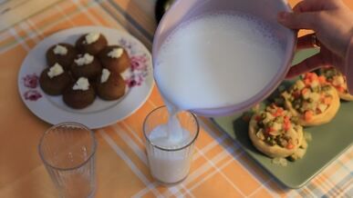 turkish breakfast with milk pouring scene