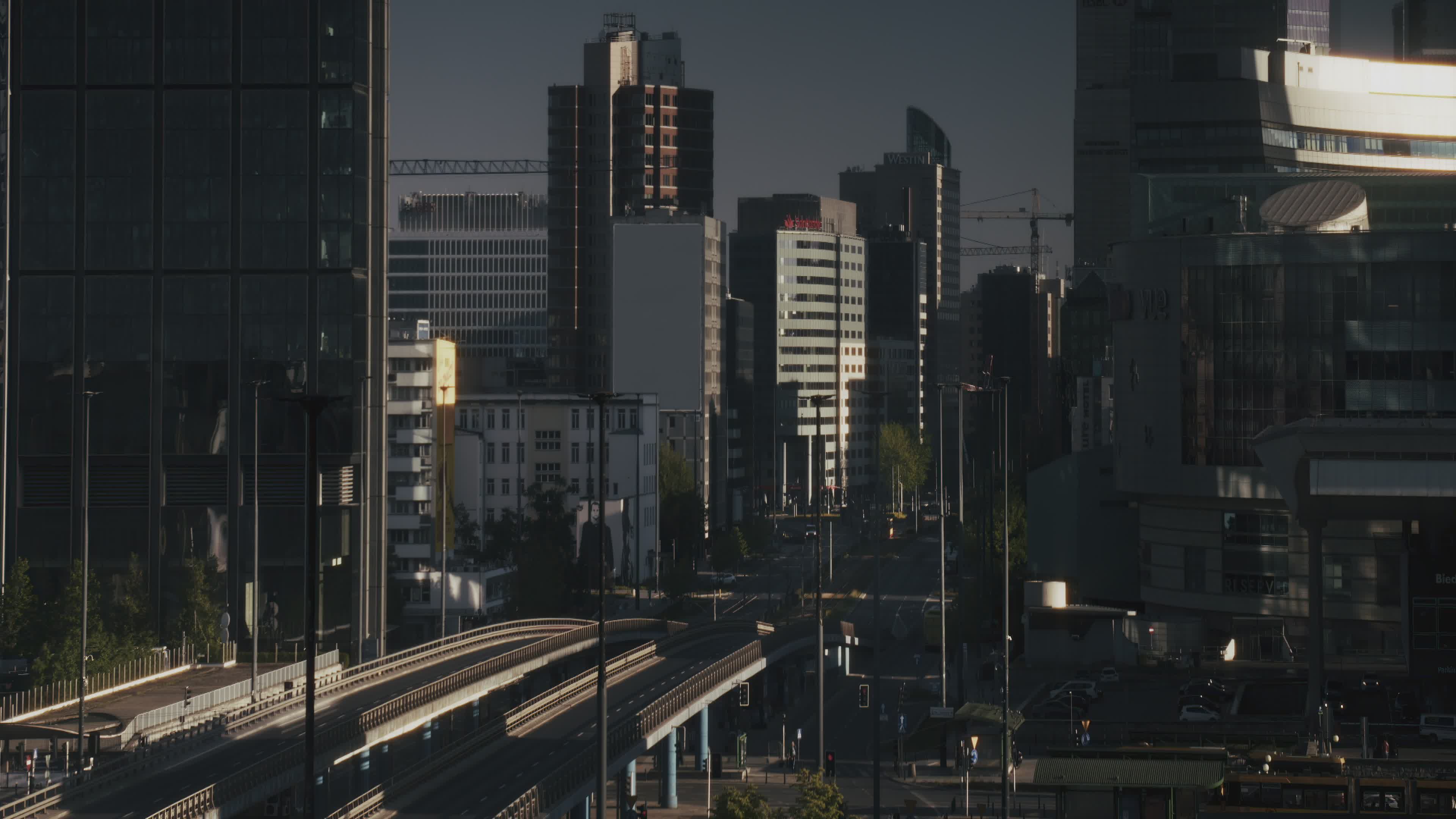 urban skyline at sunset with traffic timelapse 32347687