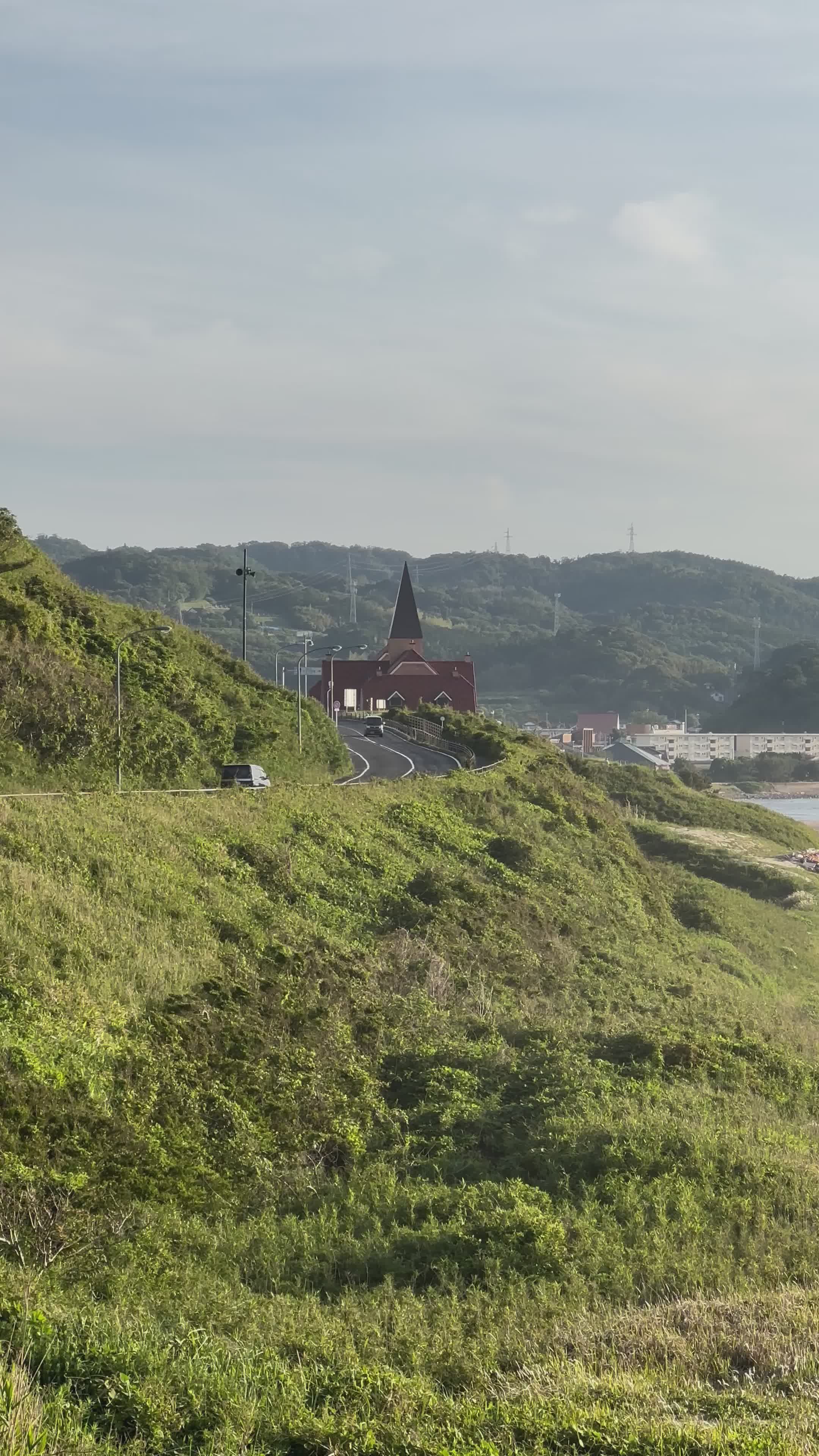 Scenic Coastal Landscape with Distant Church Free Stock Video Footage ...