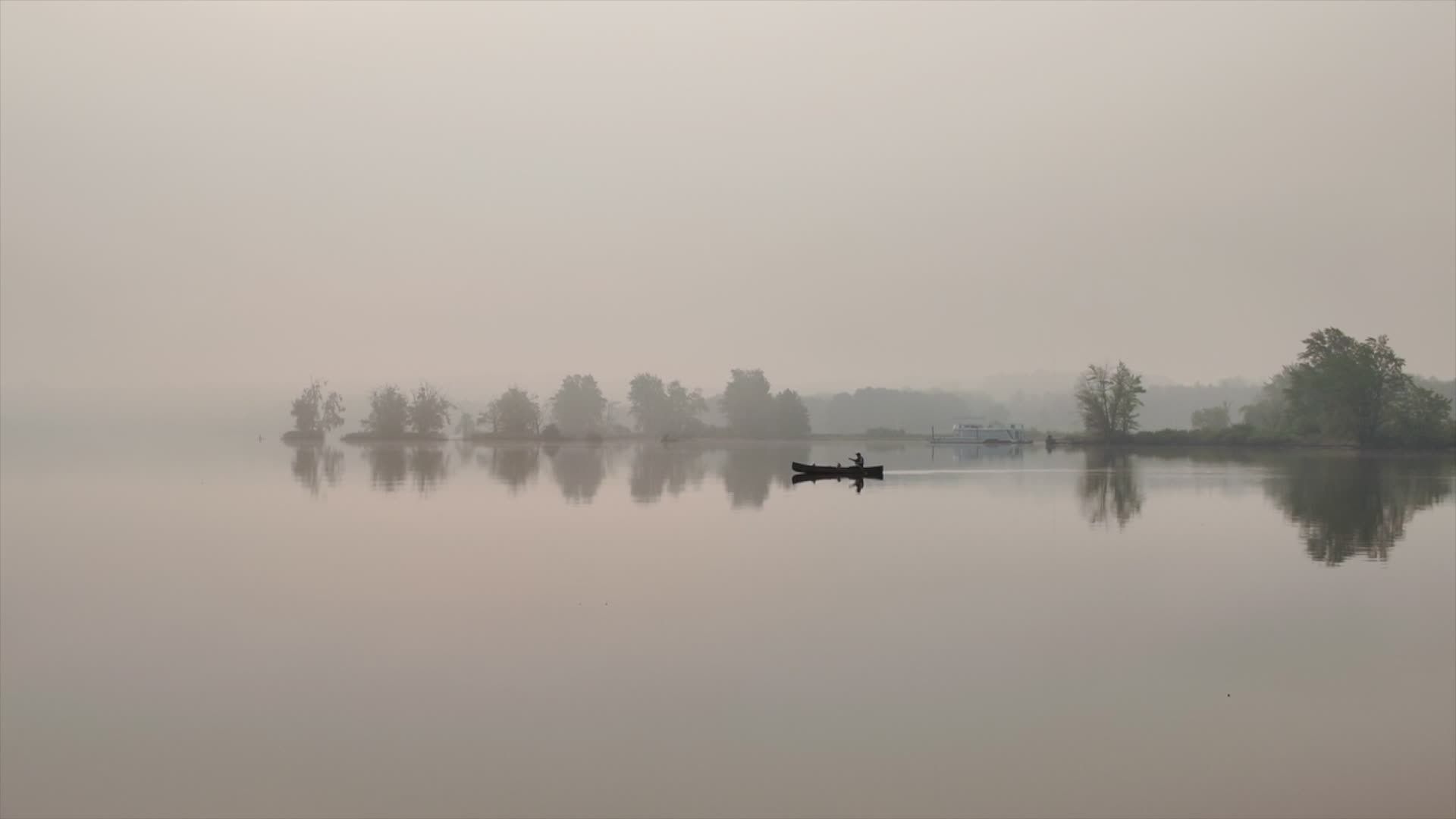 Serene Canoeing on a Misty Lake at Dawn Free Stock Video Footage ...