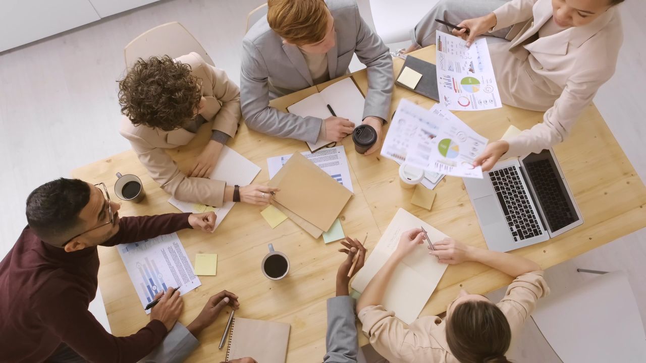 A team walking through charts and findings in a working session
